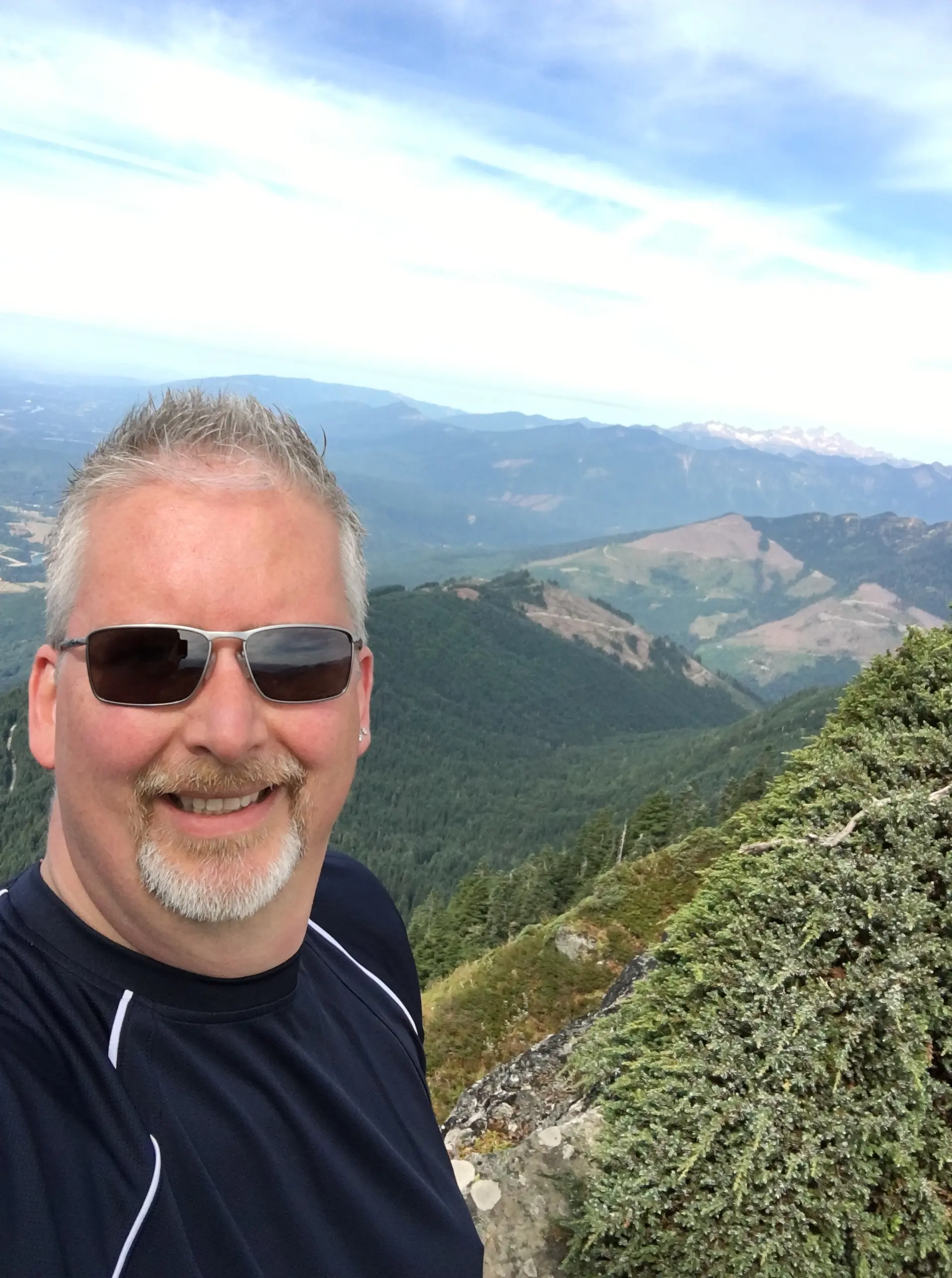photo of Michael White atop Sauk Mountain